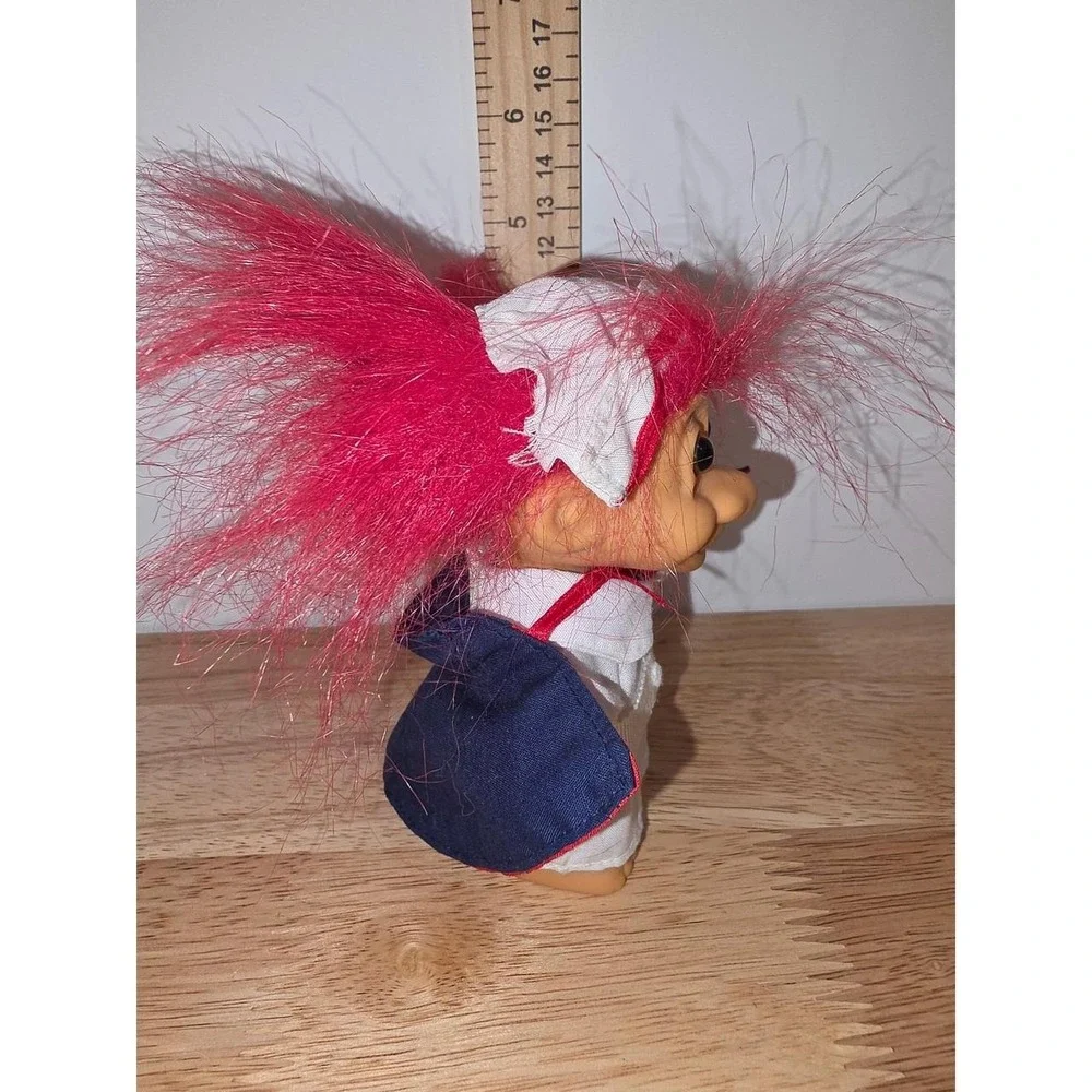 vintage Russ Berrie Florence Nightingale Nurse Troll Doll featuring bright red